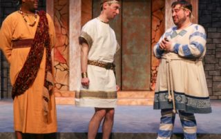 Stage scene from A Funny Thing Happened on the Way to the Forum at Metropolis Performing Arts Centre